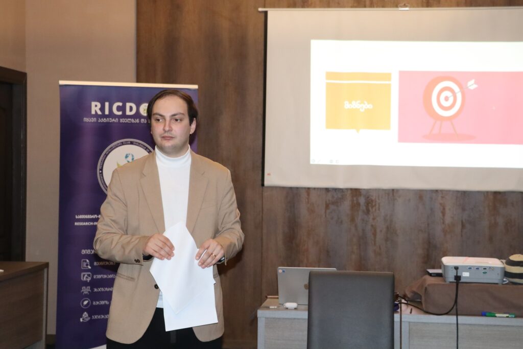 Irakli Tevzadze – trainer and youth worker, delivering a session with young people / a training group.