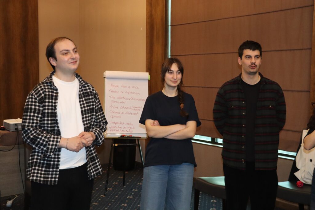Irakli Tevzadze – trainer and youth worker, delivering a session with young people / a training group.